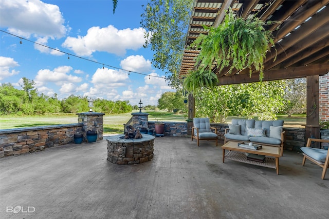 view of patio / terrace with an outdoor living space with a fire pit