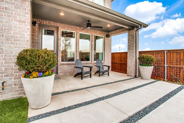 view of patio / terrace featuring ceiling fan