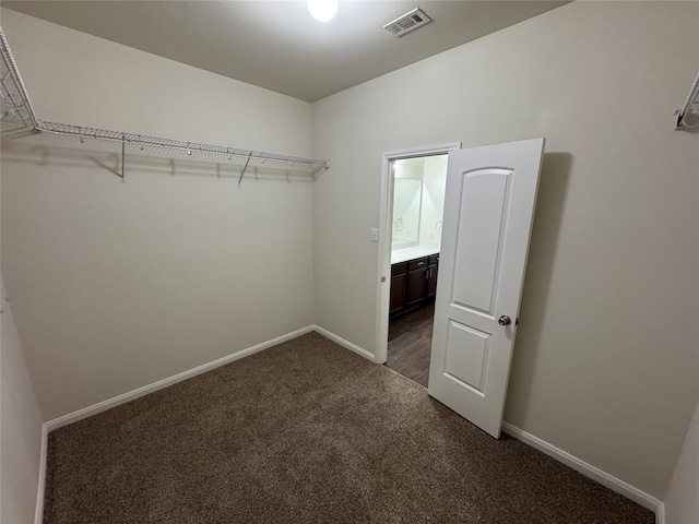 bathroom with hardwood / wood-style flooring and toilet