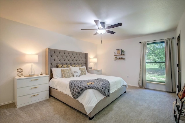 carpeted bedroom with ceiling fan