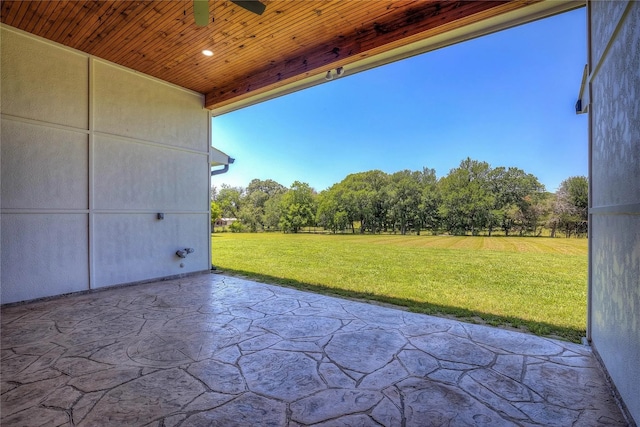 view of patio / terrace featuring ceiling fan