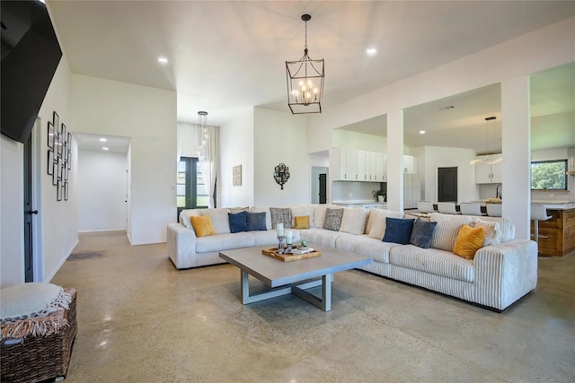 living room with a chandelier