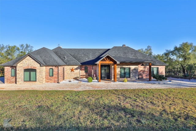 view of front of house featuring a patio area and a front yard