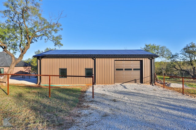 view of outdoor structure featuring a garage