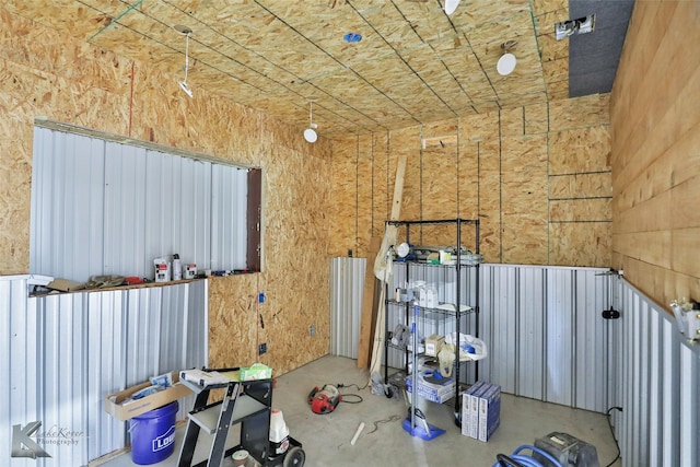 miscellaneous room with concrete flooring