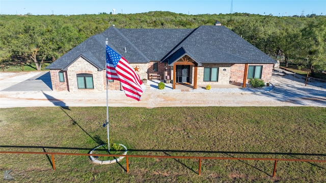 view of front of house with a front lawn