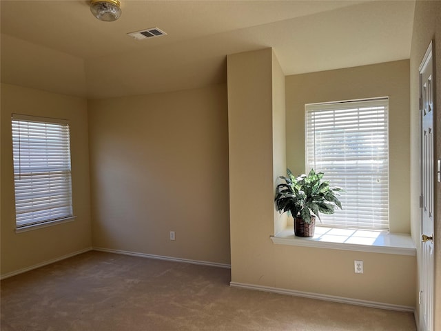 view of carpeted spare room