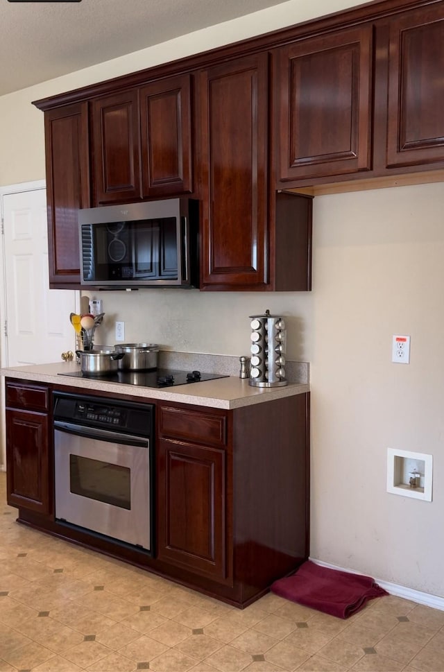 kitchen with appliances with stainless steel finishes