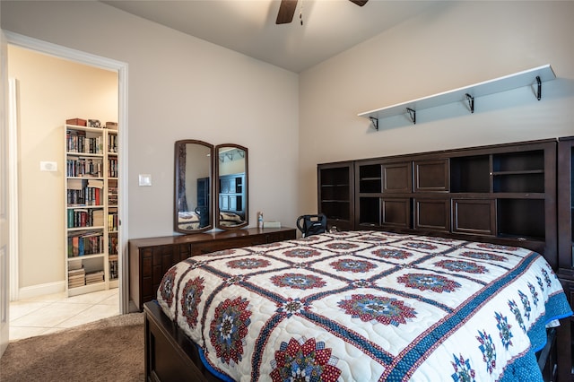 bedroom with light colored carpet and ceiling fan