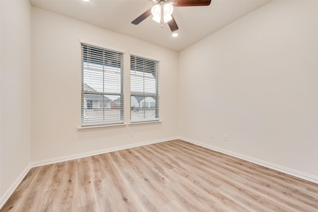 empty room with light wood-style floors, ceiling fan, baseboards, and recessed lighting