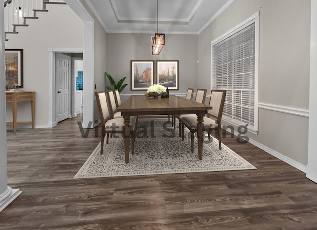 dining area featuring ornamental molding, dark wood-type flooring, and ornate columns