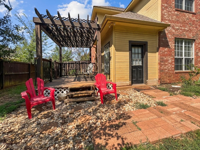 view of patio / terrace featuring a deck and a pergola