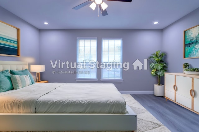 bedroom featuring recessed lighting, wood finished floors, baseboards, and ceiling fan
