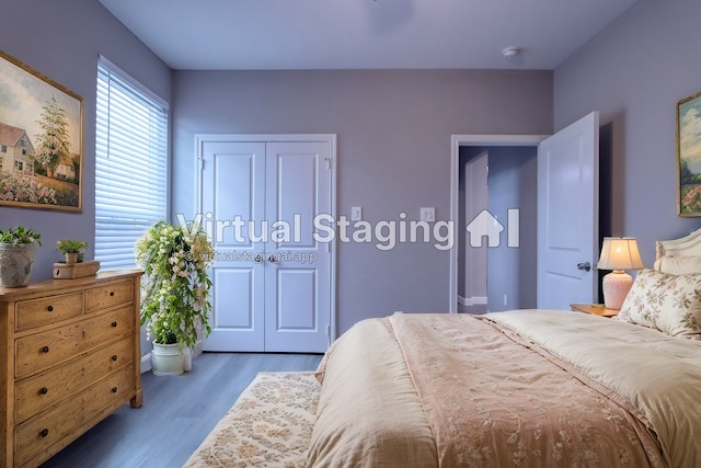 bedroom with wood finished floors
