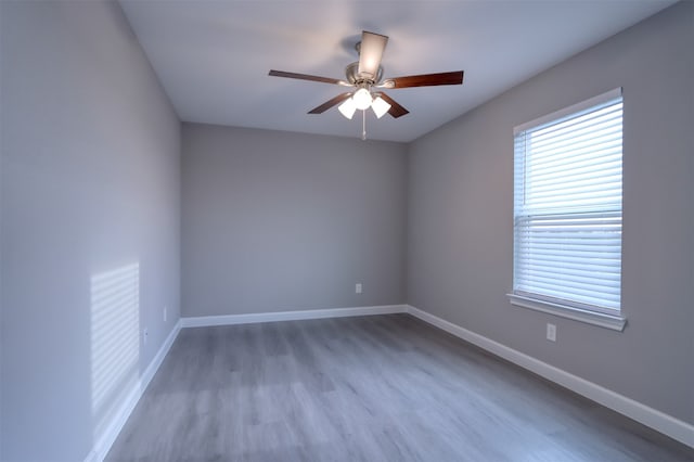 unfurnished bedroom featuring ceiling fan and light hardwood / wood-style floors