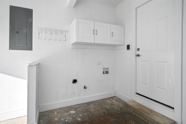 laundry room featuring hookup for a washing machine, cabinets, and electric panel