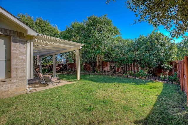 view of yard with a pergola and a patio