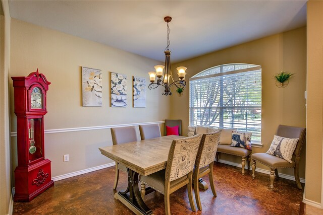 dining room featuring a chandelier