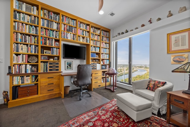 office featuring dark colored carpet