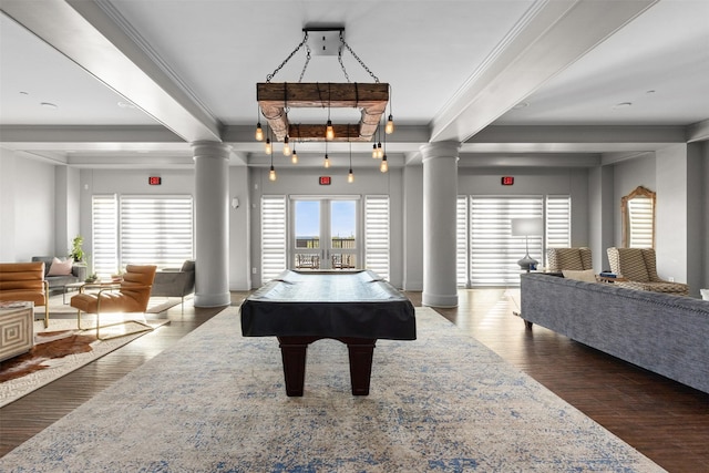 rec room with billiards, ornamental molding, ornate columns, beam ceiling, and dark hardwood / wood-style flooring