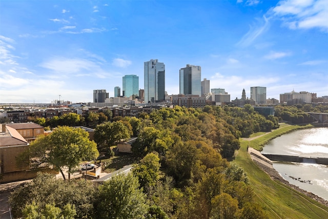 property's view of city with a water view