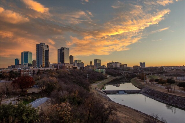 property's view of city featuring a water view