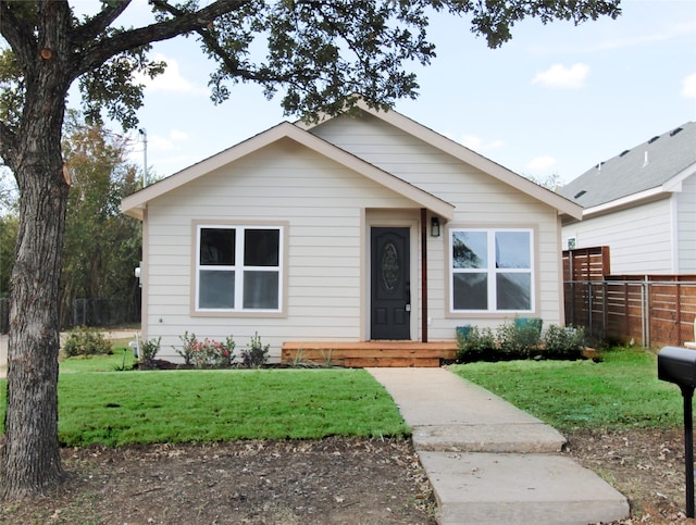 view of front of house with a front yard