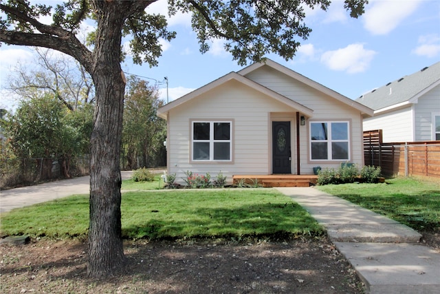 view of front of house with a front lawn