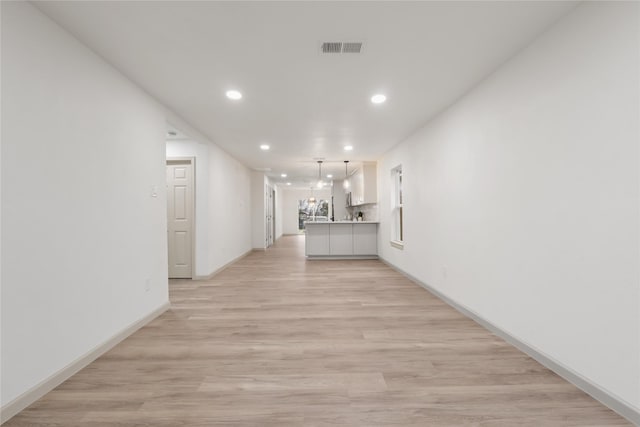 hall featuring light wood-type flooring