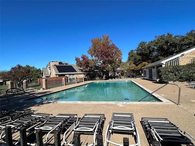 view of pool featuring a patio