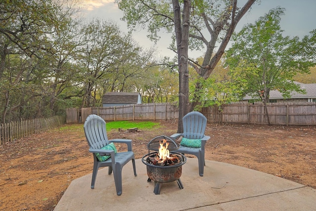 view of patio featuring an outdoor fire pit