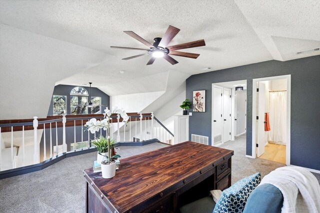 bedroom with ceiling fan, a textured ceiling, and hardwood / wood-style flooring