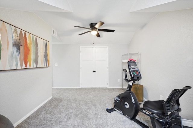 exercise area with lofted ceiling, light carpet, and ceiling fan