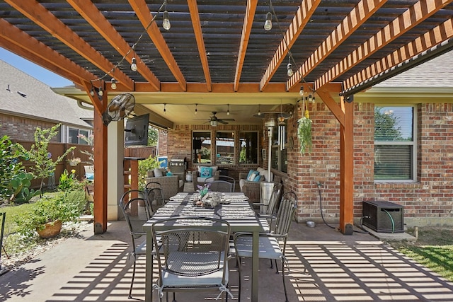 view of patio / terrace featuring a pergola and ceiling fan