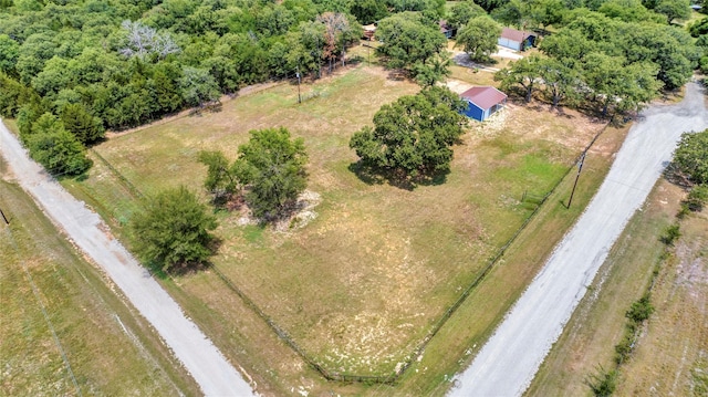 birds eye view of property featuring a rural view