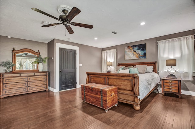 bedroom featuring recessed lighting, visible vents, baseboards, and wood finished floors