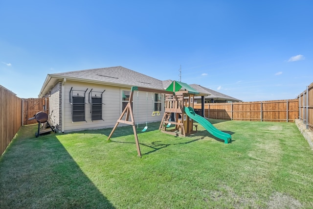 view of playground featuring a lawn