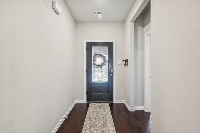 living room featuring dark hardwood / wood-style floors and ceiling fan