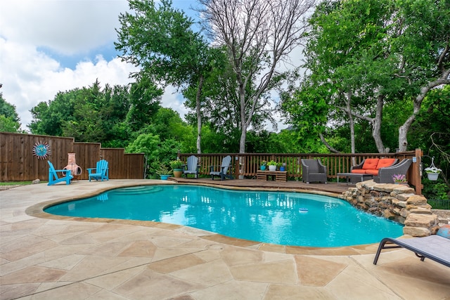 view of swimming pool featuring outdoor lounge area and a patio