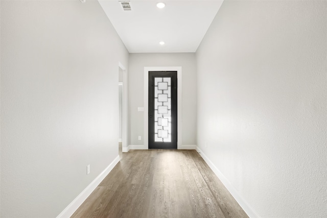 entrance foyer featuring hardwood / wood-style floors