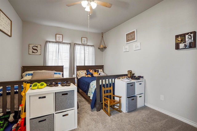 bedroom with light colored carpet and ceiling fan