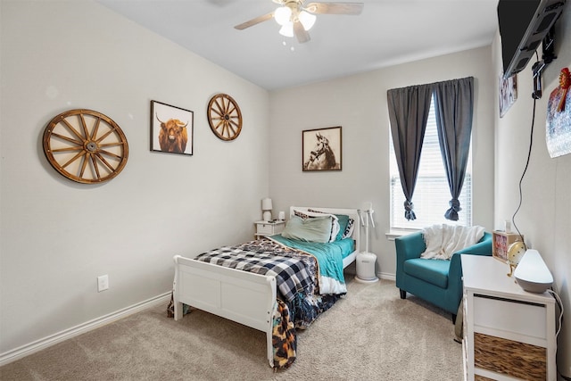 bedroom with ceiling fan and carpet floors