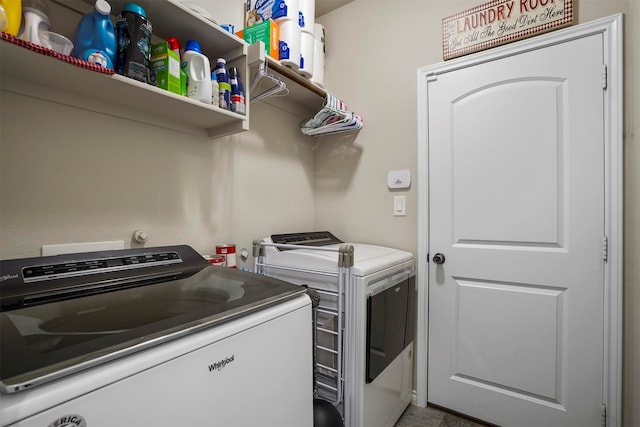 washroom with washer and dryer