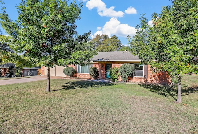 view of front facade with a garage and a front yard