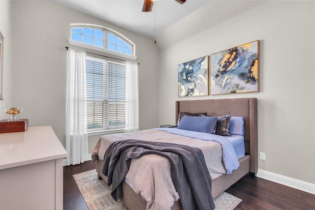 bedroom featuring dark hardwood / wood-style floors and ceiling fan