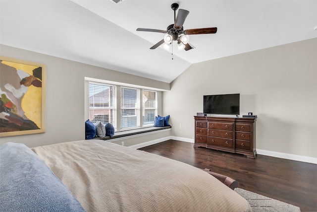 bedroom with lofted ceiling, dark hardwood / wood-style floors, and ceiling fan