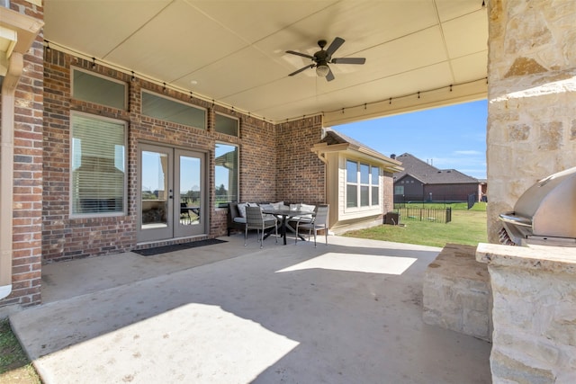 view of patio / terrace with french doors and ceiling fan