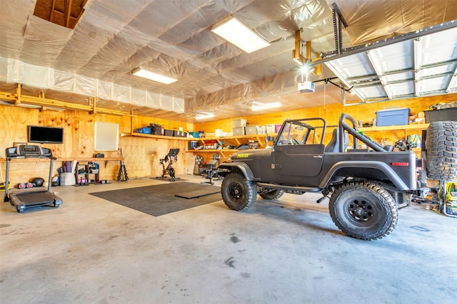 garage featuring a garage door opener