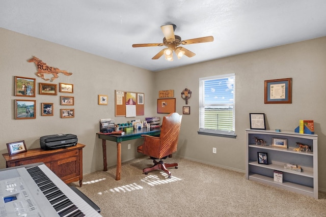 home office featuring ceiling fan and carpet floors