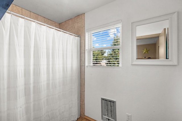 bathroom with walk in shower